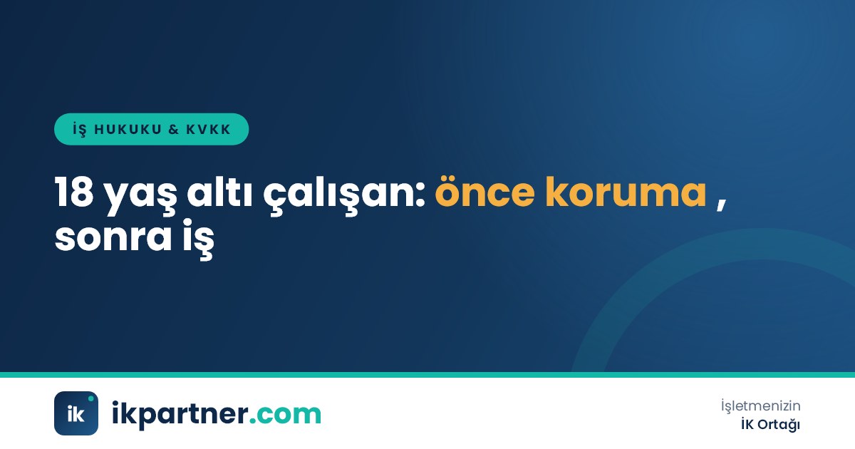 Bir işyerinde genç bir çalışana güvenlik talimatlarını anlatan deneyimli bir usta
