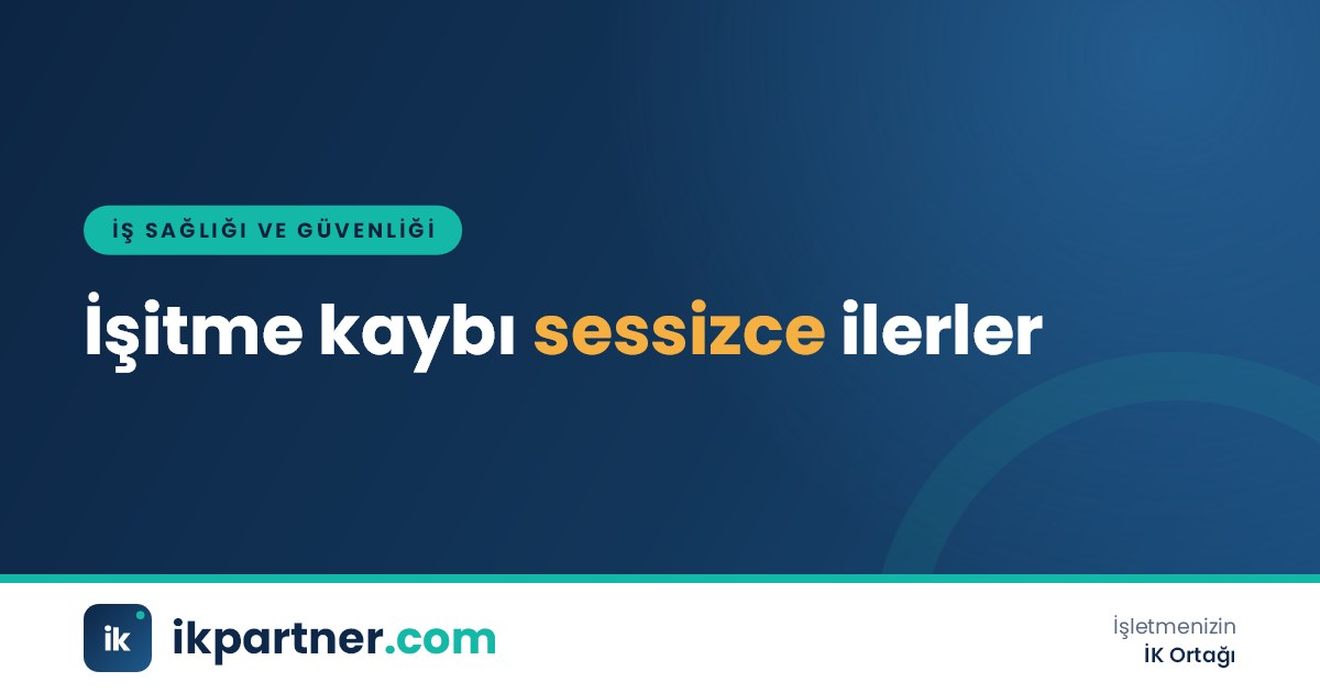 Gürültülü üretim hattında manşonlu kulak koruyucu takarak makine kullanan çalışan