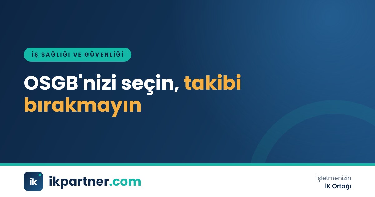 İşveren temsilcisi ile OSGB yetkilisinin toplantı masasında İSG hizmet sözleşmesini incelediği sahne