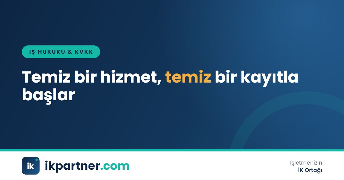 Ofis koridorunda temizlik arabasıyla çalışan temizlik personeli